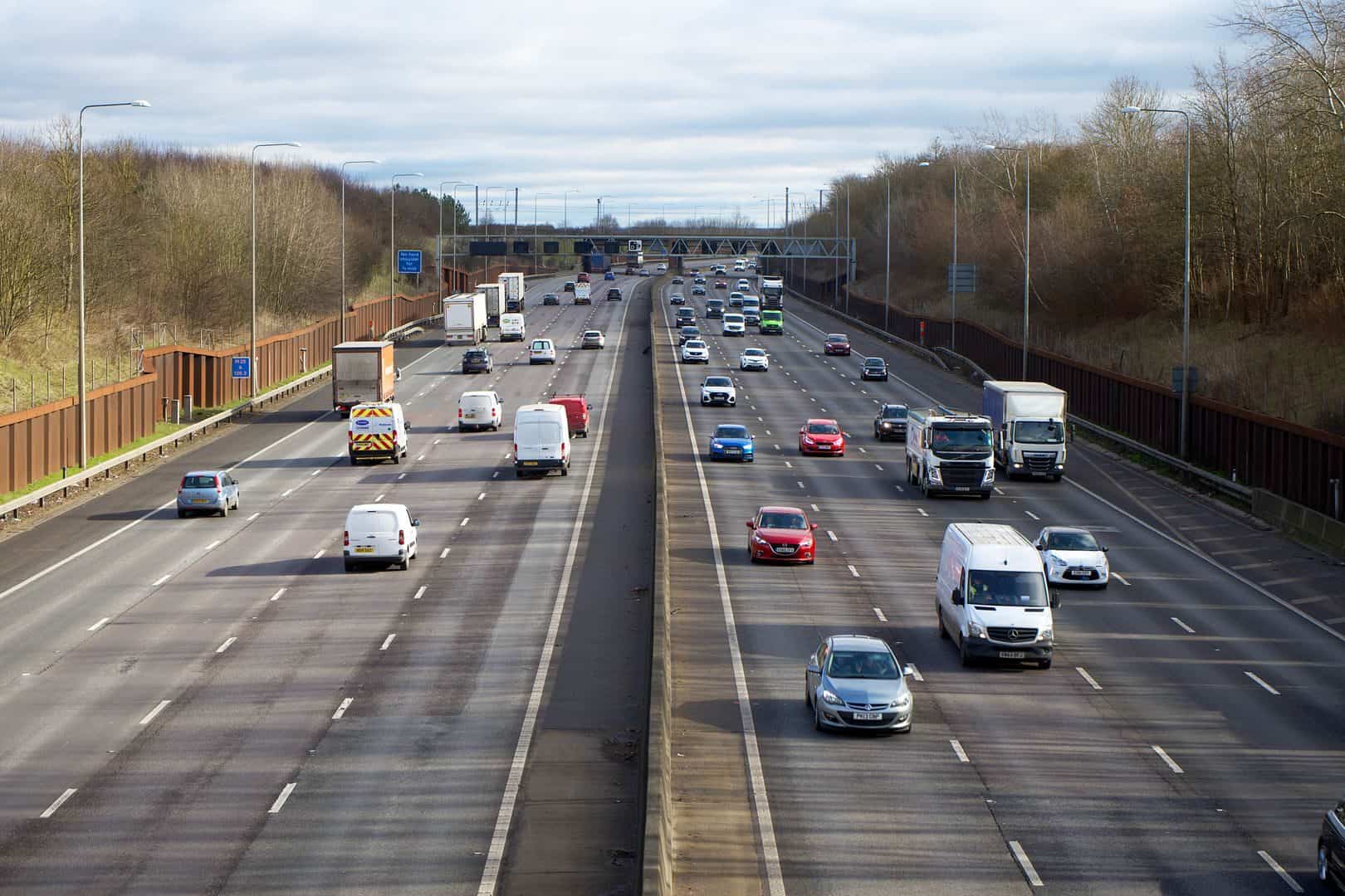 Aerial view of vehicles on a busy highway outside St Albans, England during daytime.
